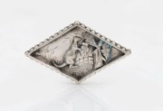 An antique sterling silver diamond shaped brooch with kangaroo decoration in landscape, 19th century, ​​​​​​​5cm wide