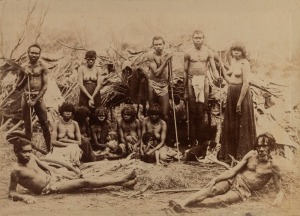 An Aboriginal family posing in front of their shelters, circa 1885, albumen paper photograph, 14 x 19cm, laid down on card; overall 20 x 25cm. Provenance: The Denis Joachim Collection Part II, 28 June 2017, Lot 35 (part).