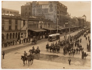 [MILITARY - BOER WAR], The Victorian Mounted Rifles parade down Swanston Street prior to their departure for South Africa in February 1901, silver gelatin photograph laid down on card, 15.5 x 20cm.