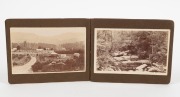 TASMANIAN POSTCARDS: WILLIAM&nbsp;FELLOWES, photographer. A small album containing 26 real-photo postcards, each with title in the plate and all marketed under the "D.I.C." brand; subjects include "Isle of the Dead", "Collinsvale near Hobart", "Macquarie Plain - 3
