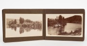 TASMANIAN POSTCARDS: WILLIAM&nbsp;FELLOWES, photographer. A small album containing 26 real-photo postcards, each with title in the plate and all marketed under the "D.I.C." brand; subjects include "Isle of the Dead", "Collinsvale near Hobart", "Macquarie Plain - 5
