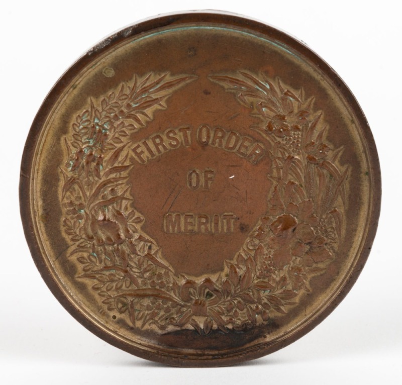 MEDAL: 1887 ADELAIDE JUBILEE INTERNATIONAL EXHIBITION gilt bronze medal by Altmann of Melbourne, "First Order of Merit" on reverse. unnamed. 75mm.