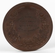 MEDAL: 1879 SYDNEY INTERNATIONAL EXHIBITION large bronze medal by Wyon (76mm), engraved on reverse to "JAMES DUNNACHIE - FIRE BRICKS and FIRE CLAY APPARATUS - FIRST PRIZE". Colman & Glendenning of Scotland exhibited their specialized fire clay products a - 2