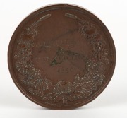 MEDAL: 1879 SYDNEY INTERNATIONAL EXHIBITION large bronze medal by Wyon (76mm), engraved on reverse to "CHARLES MALAN and T.W. STILLING 1880". Charles Malan, a long-time resident of New Caledonia is noted as an award winner for his display of Cajaput oil, - 2