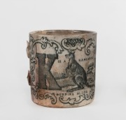 An antique English porcelain nursery mug with transfer decoration, "K is a Kangaroo Hopping Along" with kangaroo and "L is a Lion, Loud, Roaring and Strong" with lion, mid 19th century. Note: Missing Handle. 8cm high