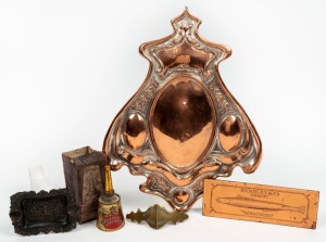 ADVERTISING AND METAL WARE: Comprising of "Kemsley & Co., Hobart, Baracuta" engraved copper sign, "R. & J. BINNIE, Sydney" folding brass mount, "WILLS'S VICE REGAL MIXTURE" pressed metal ashtray, "The New Powder Sprinkler, Anthony Hordern & Sons, Sydney" tin in original box; together with an embossed copper shield shaped plaque, 19th/20th century, (5 items), the largest 40cm high