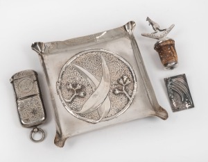 An Australian silver dish with gum leaf decoration, an English sterling silver combination vesta and sovereign case engraved with ownership monogram "W. C. a'B., 1906" (William Channing A'Beckett, MLA, 1846 - 1929), kangaroo and boomerang silver bottle stopper engraved "George D. Healy, Melbourne, 27th March, 1934" and an Australian sterling silver gum leaf brooch, (4 items), the dish 12cm wide.