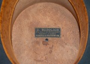 An antique top hat in original red silk lined leather travel case, 19th century, the hat bearing label "D. BUZOLICH, 'THE HAT SPECIALIST', RAILWAY BUILDINGS, FLINDERS & SWANSTON STS.", ​​​​​​​the case 48cm wide - 3