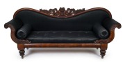 LEPPINGTON HOUSE early Colonial Australian cedar sofa, with handsomely carved and turned decoration, and finely upholstered in black horsehair, circa 1830.