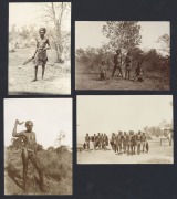 [AUSTRALIAN ABORIGINALS]. A group of photographs, various sizes and unknown photographers, circa 1900 - 1920s; including two fine studies of men making fire, fishermen hauling a giant grouper fish into their canoe, men with spears and boomerangs, a family - 3