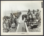 [MOVIE PUBLICITY STILLS] A group of seven Twentieth Century Fox black & white publicity photographs issued for the film "Kangaroo" in 1952, three of which feature Aboriginal tribesmen from the area of Mount Brown, near Port Augusta in South Australia; als - 3