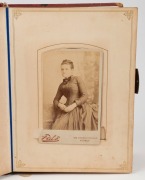 Ornate red leather album with clasp containing a collection of mainly cartes-de-visite from Sydney, Newcastle and Wollongong studios; noted a couple from Auckland and a few cabinet size images and small tintypes. Pen notation to title page "Mother gave th - 2