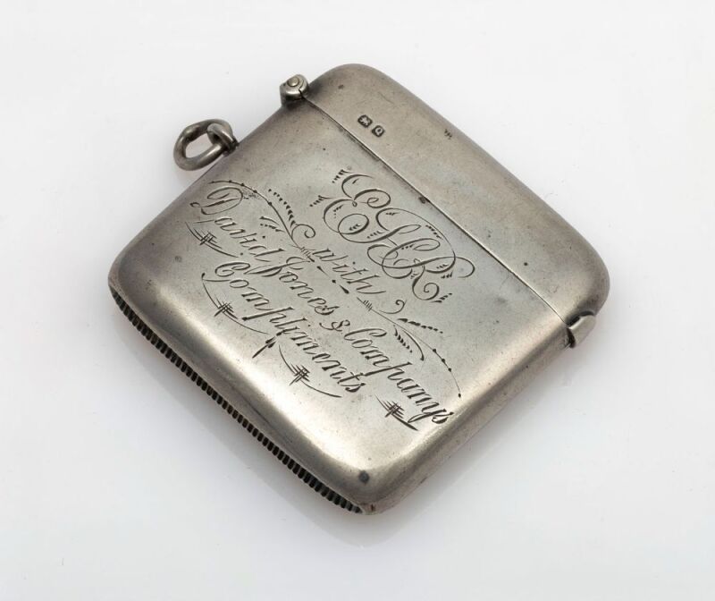 DAVID JONES & COMPANY: Antique sterling silver vesta engraved "E.H.R. with David Jones & Company Compliments after 21 years. March 3, 1881-1902", 5.5cm high, 42 grams