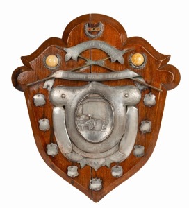 "ST. GEORGE DISTRICT, 1911. INTER-INSTITUTE BILLIARD CHAMPIONSHIP PRESENTED BY HEIRON & SMITH" Australian silver trophy shield mounted on oak board, ​​​​​​​60 x 53cm overall