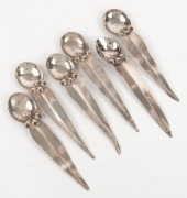 ELSIE YOUNG, set of six Australian silver teaspoons, all decorated with gumnuts and gum leaves, 20th century, (6 items), stamped "STG. SILVER", each approx. 11cm. (6).