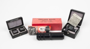 BOLEX-PAILLARD: Three accessories in maker's boxes - one early-model Prismatic Focuser, one set of two Parallax Corrector Prisms, and one set of four extension tubes for 16mm cameras. (3 items)