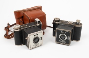 VENA: Two Venaret 120 rollfilm cameras, c. 1948, each with differing face plates, one of which with leather case. (2 cameras)