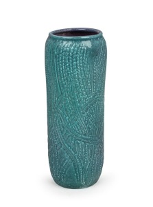 KLYTIE PATE turquoise glazed cylindrical pottery vase with Australian wildflower decoration, incised "Klytie Pate, 1992", 30.5cm high