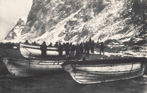 FRANK HURLEY: "The Three Boats Drawn Up Under The Inaccessible Cliffs Of Elephant Island" vintage silver gelatin photograph, 15 x 20cm, laid down on grey card, numbered "8" in the top right corner and titled in manuscript below the image. Our research sug