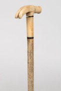 An antique walking stick with whale's tooth handle carved in the form of a hammer head with baleen spacers and whalebone shaft, 19th century, 82cm high - 2