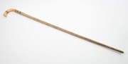 An antique walking stick with whale's tooth handle, baleen spacers and whalebone shaft, 19th century, 88cm high - 2