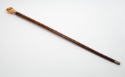 An antique walking stick with carved fist whale's tooth handle, silver collar, on a fiddleback blackwood shaft with metal ferrule,&nbsp;19th century, 93cm high - 3