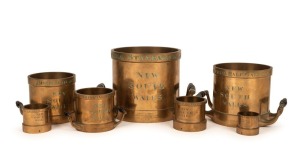IMPERIAL STANDARD MEASURES fine set of seven with original ebony carrying handles, standard gallon to half gill, each engraved "New South Wales" by Bate of London, 19th century, the standard gallon example additionally engraved "Bate, London, Maker Of The Original Standards For The Exchequer, City Of London, City Of Edinburgh, City Of Dublin &C. &C. &C."