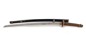 A Japanese naval officer's kai-gunto sword with black lacquered scabbard and gilt metal fittings, with affixed labels, 92cm long