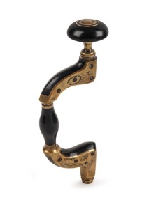 A fine quality antique drill brace, cast brass with ebony infill and inlaid ivory to the handle, 19th century, 35cm high