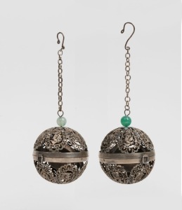 A pair of antique Chinese silver hanging incense burners, Qing Dynasty, 19th/20th century, seal marks to bases, 6cm diameter