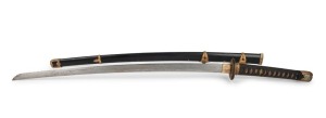 A Japanese naval officer's kai-gunto sword with black lacquered scabbard and gilt metal mounts, 97cm long