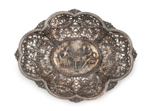 An antique German silver pierced floral bread bowl with repousse vignette, crown and crescent 800 mark, 31.5cm wide, 450 grams