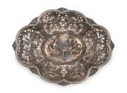 An antique German silver pierced floral bread bowl with repousse vignette, crown and crescent 800 mark, 31.5cm wide, 450 grams