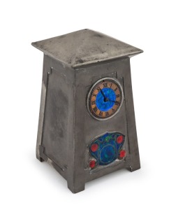 ARCHIBALD KNOX (1864 - 1933) English Arts & Crafts pewter and enamel case table clock with original key, most likely retailed by Liberty & Co. of London, stamped "English Pewter, 0629, Made in England", 18cm high