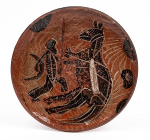 ARTUR HALPERN pottery plaque with sgraffito kangaroo and Aboriginal hunter, signed "Halpern, Melbourne, '49", 25cm diameter