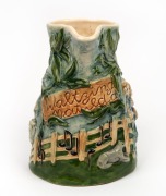 WALTZING MATILDA pottery jug with musical movement, ​​​​​​​19.5cm high