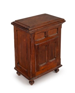 An antique Australian cedar and pine miniature ice chest, most likely an apprentice piece or salesman's sample, interior fitted with five graduated drawers, lift-top with original zinc lining and ice box, late 19th century, 32.5cm high, 24cm wide, 16cm deep