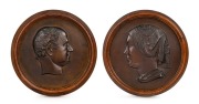 THOMAS WOOLNER (1825-1892), important pair of bronze portrait plaques of Dr Godfrey Howitt and Phoebe Howitt of Melbourne, circa 1853. Both signed "T. Woolner, Sc. 1853". Housed in original circular timber frames. The plaques approximately 23cm diameter, 