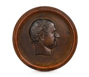 THOMAS WOOLNER (1825-1892), important pair of bronze portrait plaques of Dr Godfrey Howitt and Phoebe Howitt of Melbourne, circa 1853. Both signed "T. Woolner, Sc. 1853". Housed in original circular timber frames. The plaques approximately 23cm diameter, - 2