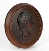 THOMAS WOOLNER (1825-1892), important pair of bronze portrait plaques of Dr Godfrey Howitt and Phoebe Howitt of Melbourne, circa 1853. Both signed "T. Woolner, Sc. 1853". Housed in original circular timber frames. The plaques approximately 23cm diameter, - 5