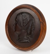THOMAS WOOLNER (1825-1892), important pair of bronze portrait plaques of Dr Godfrey Howitt and Phoebe Howitt of Melbourne, circa 1853. Both signed "T. Woolner, Sc. 1853". Housed in original circular timber frames. The plaques approximately 23cm diameter, - 8