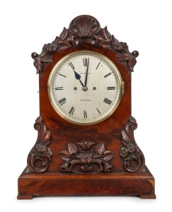 An antique English spring table clock in carved mahogany case, twin train fusee movement with Roman numerals, dial marked "FIELD. STROUD", mid 19th century, 54.5cm high