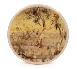 ARTHUR MERRIC BOYD & NEIL DOUGLAS, pottery dish with hand-painted landscape scene, titled on the back, signed "Neil Douglas", 14.5cm diameter