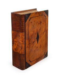 A stunning Colonial Australian book box of impressive proportions, fiddleback blackwood, huon pine, cedar and other timbers, interior fitted with lidded compartments, Tasmanian origin, circa 1840s, 11cm high, 35cm wide, 25cm, deep. PROVENANCE: Gowan's Auctions, Tasmania, August 16th, 2022, lot 249.