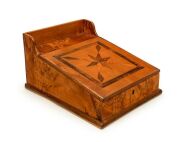 An unusual antique Australian writing slope, crafted from solid slabs of birdseye huon pine inlaid with fiddleback blackwood, cedar, myrtle, red pine and huon pine, Tasmanian origin, 19th century, 25cm high, 36cm wide, 46cm deep