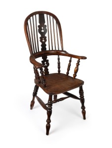 An antique English Windsor chair with pierced and carved back splat, 18th century, 117cm high, 66cm across the arms