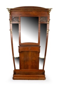 An antique French Art Nouveau oak hallstand with floral pressed panels, single drawer with shelf and brass fittings, circa 1920, 205cm high, 112cm wide, 23cm deep