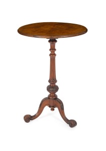 An antique English circular top occasional table, burr walnut book matched veneered top over a turned and fluted stem terminating on well carved cabriole scroll legs, circa 1890, 73cm high, 53cm diameter