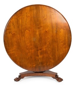 An antique English William IV tilt-top breakfast table, circular rosewood veneered top with cross grain thumbnail moulding, faceted baluster pedestal supported by tri-form base terminating in lion's paw feet with recessed casters, circa 1845, 72cm high, 1
