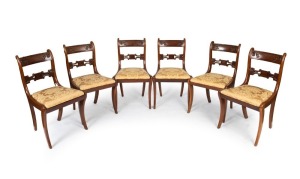 A set of six antique English mahogany William IV dining chairs with sabre legs, circa 1845, 82cm high, 38cm across the seat